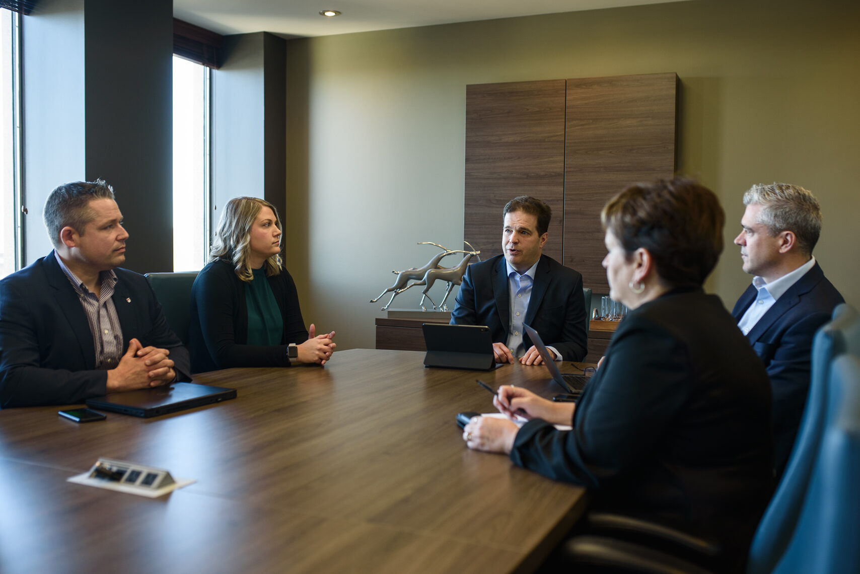 Louisbourg portfolio managers in a meeting